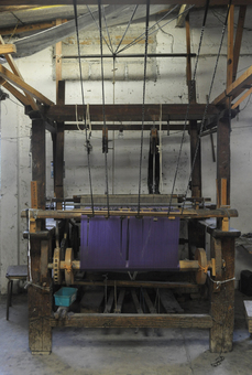 A wooden loom where our rebozo scarves are made