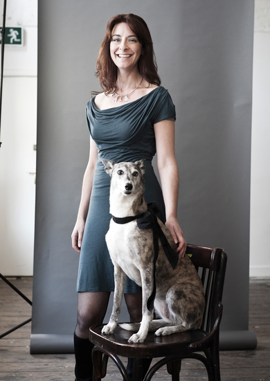 A woman and her Whippet/Blue Merle Collie cross