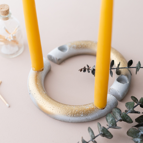 Gold candle stick holder