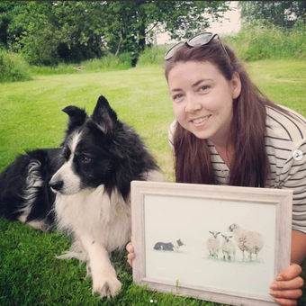 business owner with pet dog and border collie painting