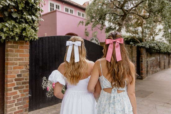 white and pink satin hair bows