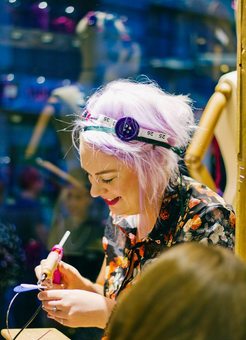 Sophie making custom headbands at London Fashion Week