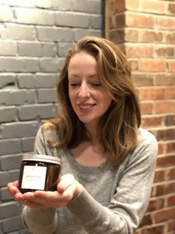 Siân Griffiths wick + wonder founder holding candle