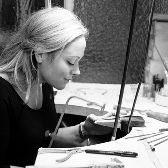 Jewellery designer Emma-Kate making jewellery at her workbench