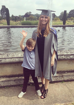 Sarah and her son on her graduation day