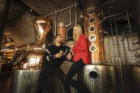 A picture of our founders, Jen and Seb, in the distillery