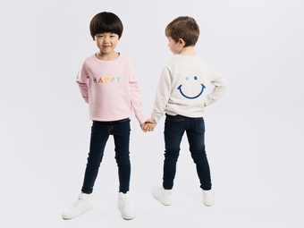 The Happy Sweatshirt features a big cute smile on the reverse and the word happy on the front in our signature rainbow text