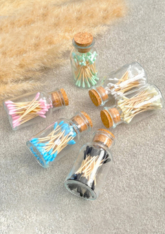 colourful cotton buds in a mason glass jar. Ear sticks and a-tips in various colours set in a mini glass jar.