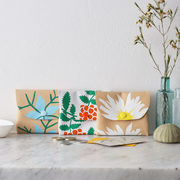 A popular selection of Botanical Leather Coin and Card Purses hand screen printed by Jenny Sibthorp