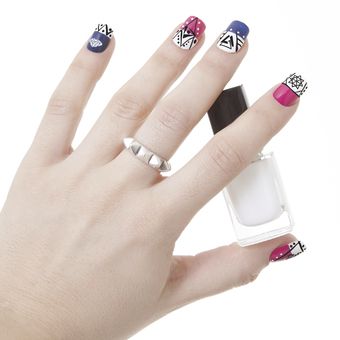 For the abstract look, use Apharsec Cubisticated nail stamp