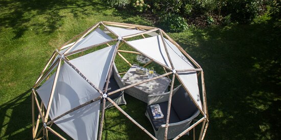 Garden pod arbour with shade sails creates a lovely outdoor space