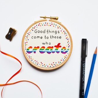 a rainbow themed hand embroidery of the quote 'Good things come to those who create'
