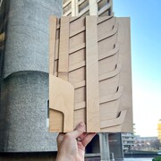 plywood picture infront of the barbican tower