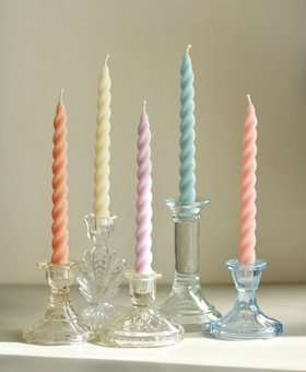 Pastel candles and candlesticks / candle holders