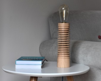 The Branscombe Lamp base is hand-turned from sustainable Ash wood sourced in Devon.