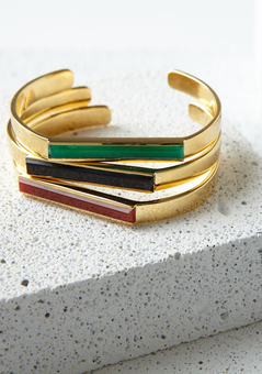 The geometric lines in this collection embrace deep jewel tones that reflect a bold attitude with subtle sophistication.