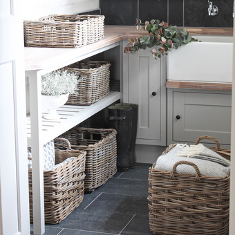 boot room with grey wicker rattan baskets 