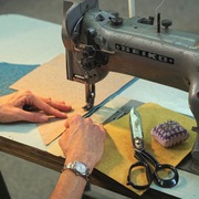 Sadie hands at sewing machine