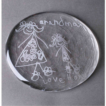 Children's drawing on crystal glass paperweight