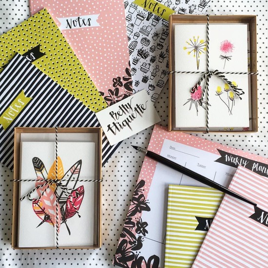 A collection of Betty Etiquette stationery and paper goods