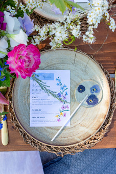 Edible flower wedding favour lollipop table setting
