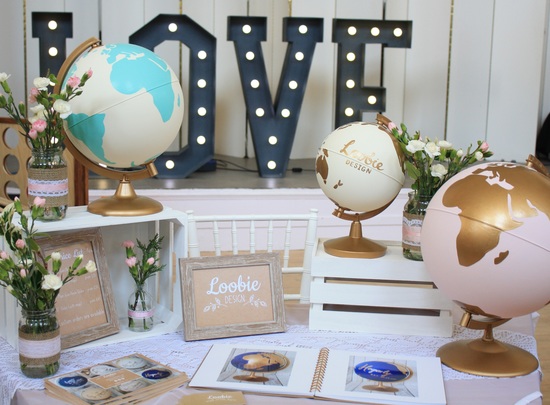 Loobie Design globes displayed on table
