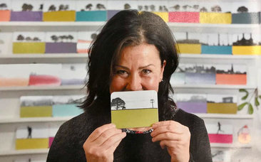 Jacky Al-Samarraie, the founder and designer of The Art Rooms, pictured with her landscape coasters.