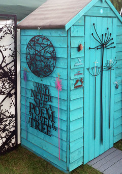 Garden shed with wall art