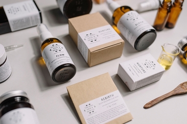 beauty products in sustainable packaging arranged decoratively