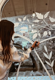 Laura painting mural