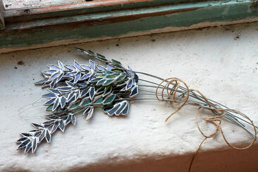 Rustic bundle of stained glass wildflowers tied with string