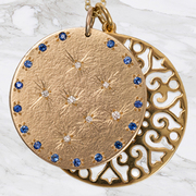 9ct Yellow Gold medal with set Diamonds and Blue sapphires with a  large lace flower disc pendant