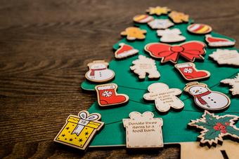Wooden magnetic decorations with acts of kindness to complete