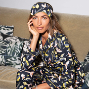 Charlotte wears our pyjama set in "Parrot Nation"