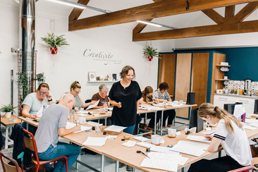 Claire teaching a calligraphy workshop in Cumbria