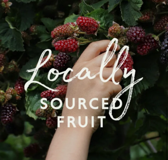 Picking berries with text 'Locally sourced fruit'
