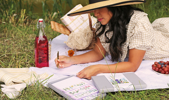 Making meadows writing set with girl writing