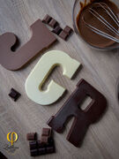 OUR CLASSIC CHOCOLATE LETTERS A delightful and personal gift The enjoyment of this delicious chocolate is enhanced by the personal gesture that is the letter.