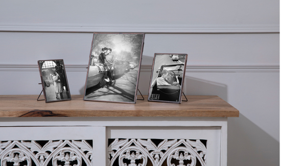 Handcrafted photo frame set on table
