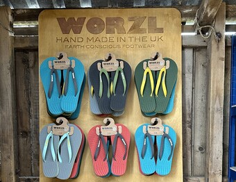 Selection of Worzl flip flops in different colours handmade in the UK