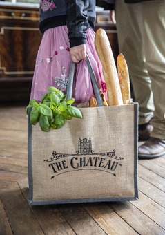 The Chateau Jute Shopper filled with fresh baguettes and vegetables