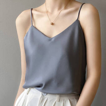 Model wearing silver grey silk camisole top