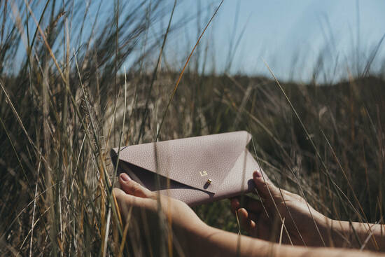 British made recycled leather clutch in Lilac