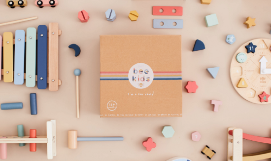 JBK product flatlay of wooden toys