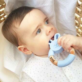 Jack with his personalised Teething toy. Silicone personalised teething bunny.