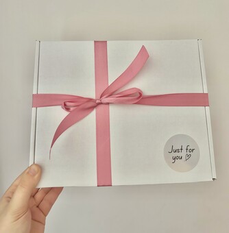 All Hampers Are Wrapped With A Pink Bow