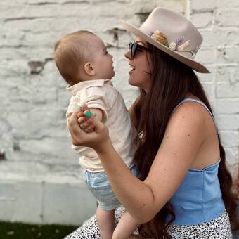 Wearing one of my hand embroidered fedoras whilst playing with my son 