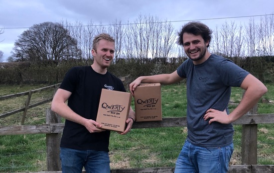 Niki and Quinn With a QWERTY Beer Box