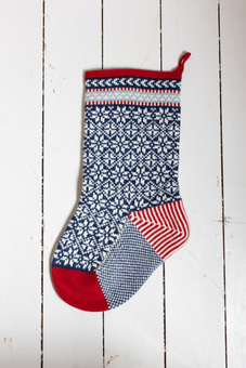 Scandinavian inspired knitted Christmas stocking in red, blue and white lambswool
