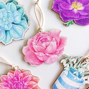 pink roses and plants hanging wooden decorations